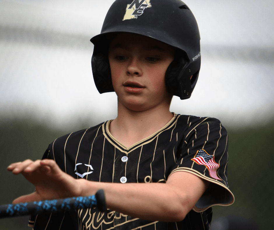 Jr Ghost youth player working on hitting fundamentals
