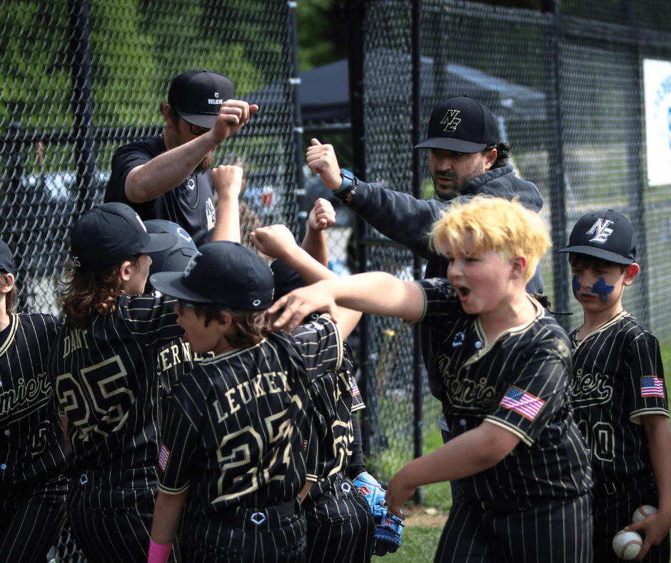 Ghost Premier youth players celebrating with high fives